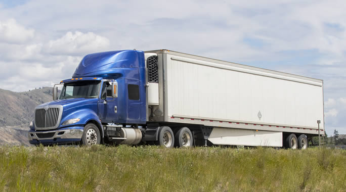 Illustration of four delivery trucks on an orange background