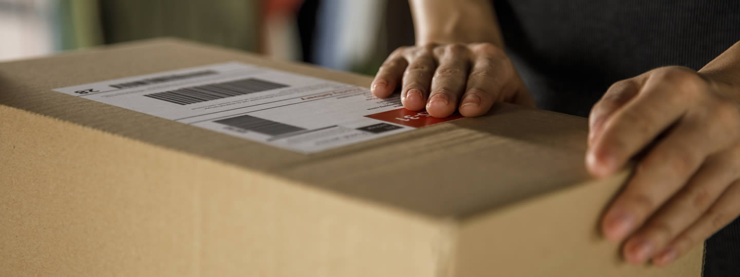 an orange icon of a fuel pump pops against a teal background