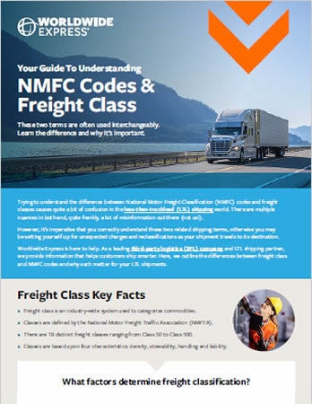 reaching up with the other. Metal shelving lines the warehouse