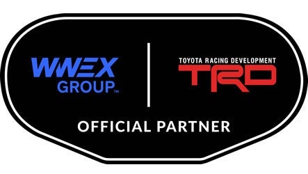 A black badge with a white border displays WWEX Group in blue, TRD USA in red, and Official Partner in white lettering, highlighting the official relationship between these brands.